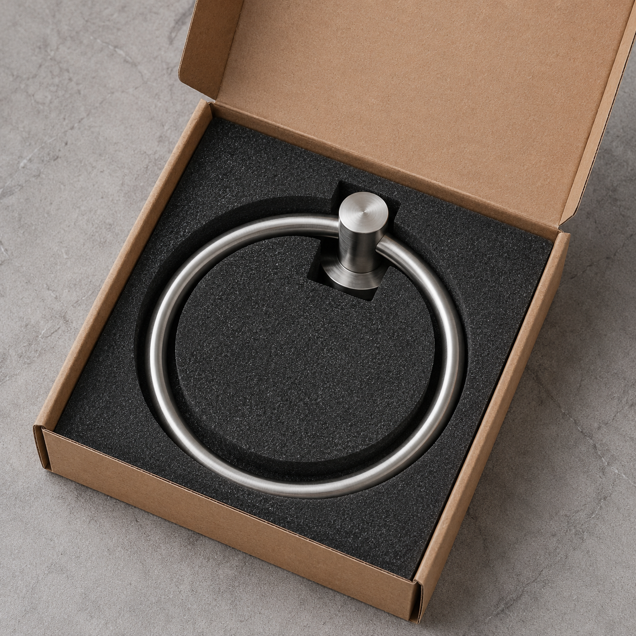 Bathroom hardware packed in protective foam inside a kraft box